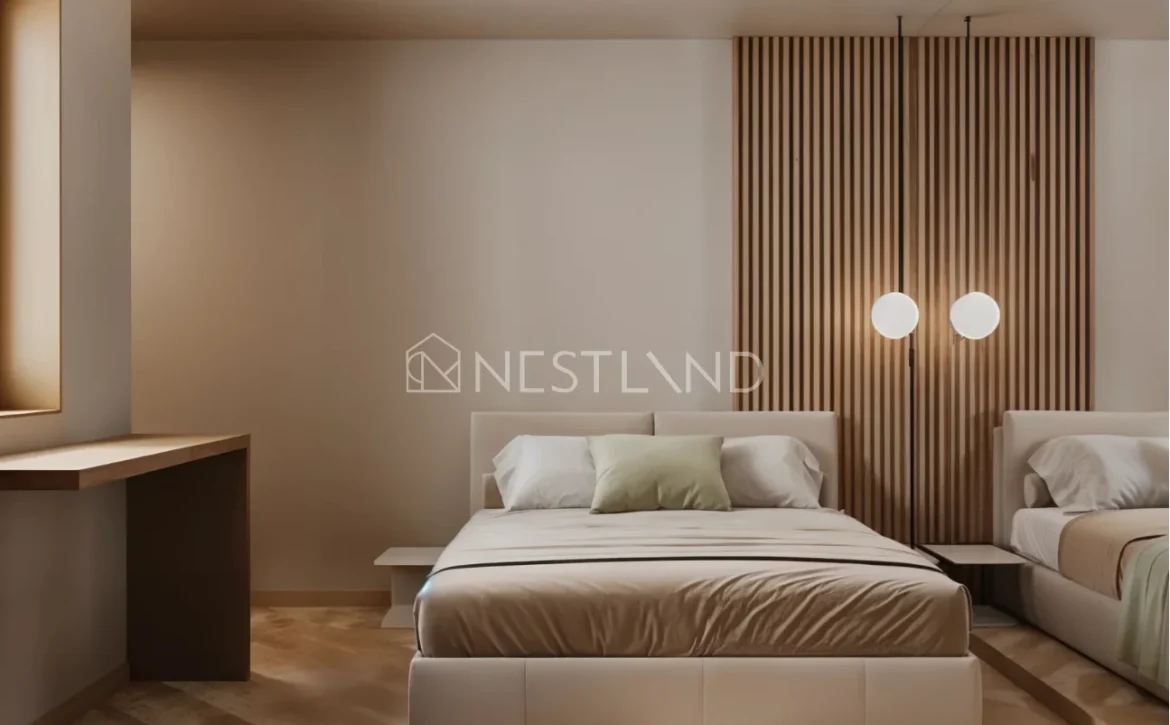 Modern bedroom with a large bed, wooden accents, and soft lighting.