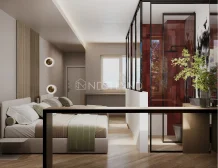 Modern bedroom with beige accent wall, stylish bed, and glass room divider.