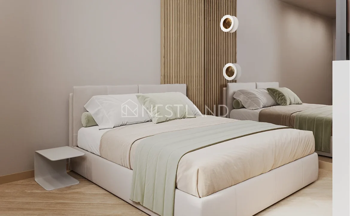 Modern bedroom with a double bed, wooden paneling, and round wall lamps.