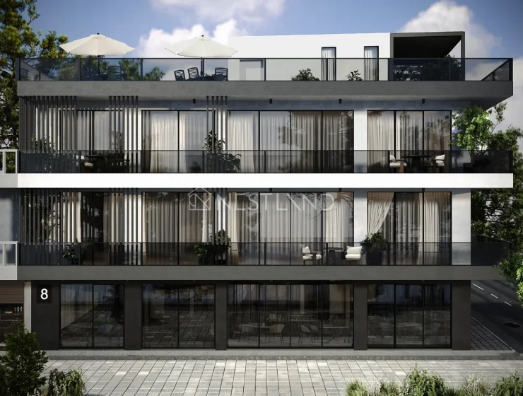 Modern multi-story building with balconies, large windows, and exterior vertical blinds.